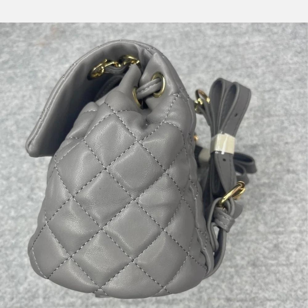 Badgely Mischka quilted mini  backpack, gray with gold tone hardware NWT
